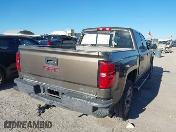 2015 GMC Sierra 1500 Denali with VIN 3GTU2WEC0FG107166, listed as a IAAI auction lot 43572747 with 159,189 mi miles and . Bid and sale history available at DreamBid. Image 4.