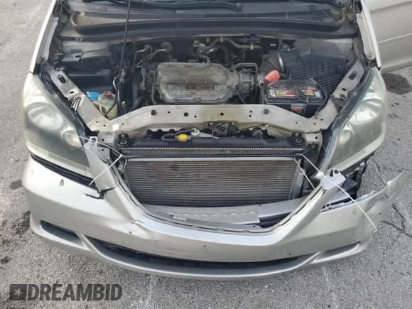 2007 Honda Odyssey EX z VIN 5FNRL38447B126896, wystawiony jako Copart lot #80313045 z przebiegiem 89 209 mil mil oraz Szkoda całkowita • Salvage title. Historia ofert i sprzedaży dostępna na DreamBid. Obrazek 12.