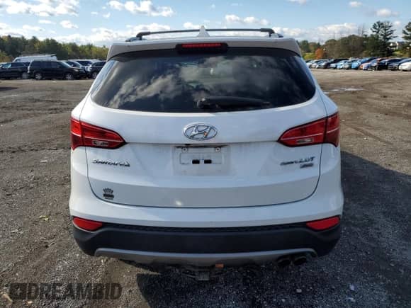 2015 Hyundai Santa Fe с VIN 5XYZUDLA4FG261139, выставлен на аукционе Copart как лот 86995445 с пробегом 90 078 миль миль и Списание • Salvage title. История ставок и продаж доступна на DreamBid. Изображение 6.