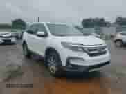 2022 Honda Pilot EX-L with VIN 5FNYF6H51NB033201, listed as a Copart auction lot 66617825 with 62,310 mi miles and Salvage title. Bid and sale history available at DreamBid. Image 14.