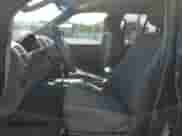 2007 Nissan Frontier SE with VIN 1N6AD09U67C404764, listed as a Copart auction lot 66150275 with 134,068 mi miles and Salvage title. Bid and sale history available at DreamBid. Image 7.