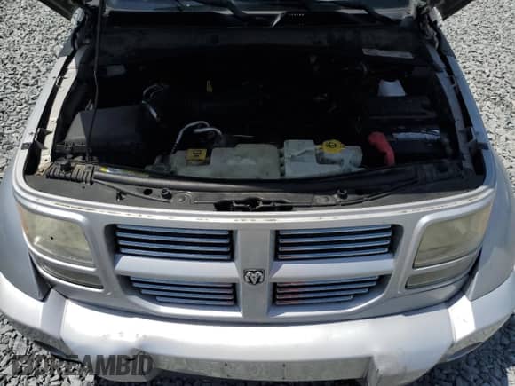 2011 Dodge Nitro Heat with VIN 1D4PT4GK5BW605204, listed as a Copart auction lot 52677235 with 104,039 mi miles and Salvage title. Bid and sale history available at DreamBid. Image 11.