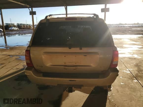 2000 Jeep Grand Cherokee Limited z VIN 1J4GW58N0YC419352, wystawiony jako Copart lot #86405605 z przebiegiem 211 579 mil mil oraz Czysty tytuł • Clean title. Historia ofert i sprzedaży dostępna na DreamBid. Obrazek 6.