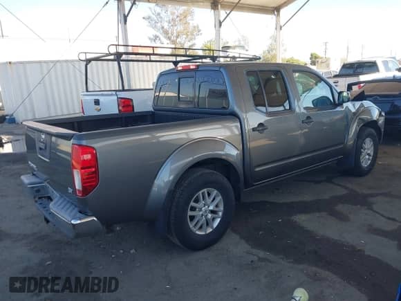 2017 Nissan Frontier SV z VIN 1N6AD0ER0HN727263, wystawiony jako IAAI lot #43399064 z przebiegiem 20 670 mil mil oraz . Historia ofert i sprzedaży dostępna na DreamBid. Obrazek 4.