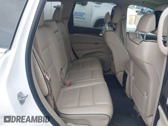 2017 Jeep Grand Cherokee Overland with VIN 1C4RJFCG6HC941771, listed as a IAAI auction lot 42356577 with 192,318 mi miles and . Bid and sale history available at DreamBid. Image 8.