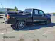 2004 GMC Sierra 1500 SLT z VIN 1GTEK19T84Z230051, wystawiony jako Copart lot #69523035 z przebiegiem 313 686 mil mil oraz Szkoda całkowita • Salvage title. Historia ofert i sprzedaży dostępna na DreamBid. Obrazek 3.