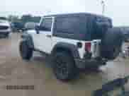 2015 Jeep Wrangler Sport with VIN 1C4AJWAG1FL593777, listed as a IAAI auction lot 42952137 with 99,393 mi miles and . Bid and sale history available at DreamBid. Image 3.