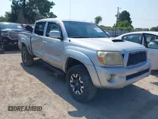 2010 Toyota Tacoma PreRunner z VIN 3TMJU4GN0AM098480, wystawiony jako IAAI lot #43012796 z przebiegiem Nie podano mil oraz . Historia ofert i sprzedaży dostępna na DreamBid. Obrazek 1.