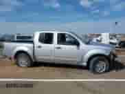 2014 Nissan Frontier S with VIN 1N6AD0EV1EN716684, listed as a IAAI auction lot 41861705 with Not provided miles and . Bid and sale history available at DreamBid. Image 12.