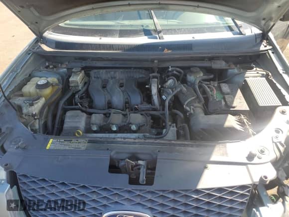 2005 Ford Freestyle SE with VIN 1FMZK01145GA23073, listed as a Copart auction lot 71931505 with 215,349 mi miles and Salvage title. Bid and sale history available at DreamBid. Image 11.