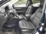 2024 Mazda CX-5 S Select z VIN JM3KFBBM5R0383781, wystawiony jako Copart lot #69091465 z przebiegiem 4 963 mil mil oraz Szkoda całkowita • Salvage title. Historia ofert i sprzedaży dostępna na DreamBid. Obrazek 7.