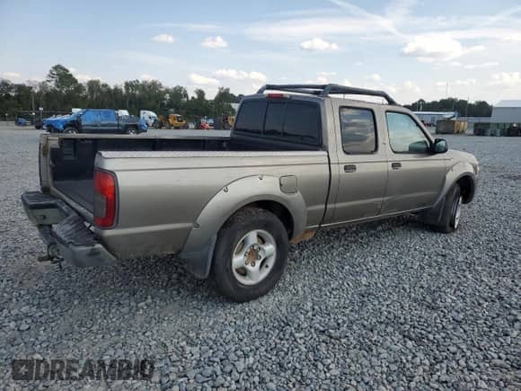 2004 Nissan Frontier XE with VIN 1N6ED29X34C403610, listed as a Copart auction lot 81246175 with 215,015 mi miles and Clean title. Bid and sale history available at DreamBid. Image 3.