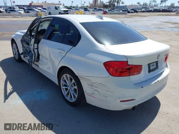 2016 BMW 3 Series 320i with VIN WBA8A9C56GK619015, listed as a IAAI auction lot 42261892 with 126,737 mi miles and . Bid and sale history available at DreamBid. Image 3.