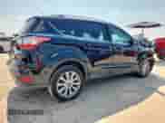 2017 Ford Escape Titanium with VIN 1FMCU0JD6HUB79020, listed as a Copart auction lot 67722175 with 102,901 mi miles and Salvage title. Bid and sale history available at DreamBid. Image 3.