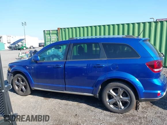 2015 Dodge Journey Crossroad with VIN 3C4PDDGG1FT579170, listed as a IAAI auction lot 42820291 with 97,385 mi miles and . Bid and sale history available at DreamBid. Image 13.