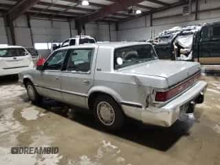 1989 Dodge Dynasty с VIN 1B3BC4634KD442902, выставлен на аукционе Copart как лот 85151394 с пробегом 63 120 миль миль и Чистый • Clean title. История ставок и продаж доступна на DreamBid. Изображение 2.