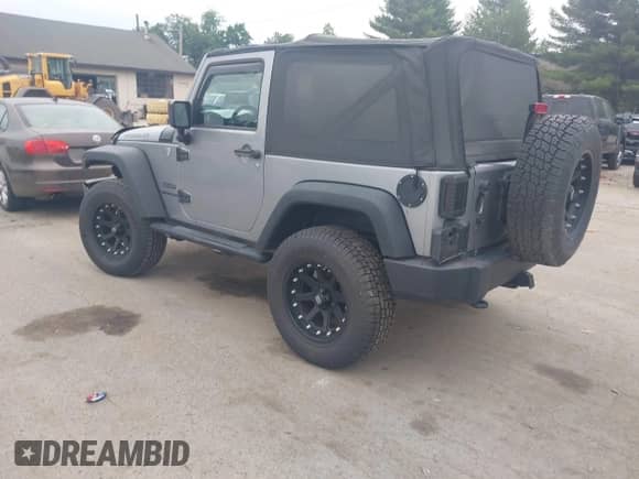2014 Jeep Wrangler Sport with VIN 1C4AJWAG1EL140354, listed as a IAAI auction lot 42605094 with 151,132 mi miles and . Bid and sale history available at DreamBid. Image 3.
