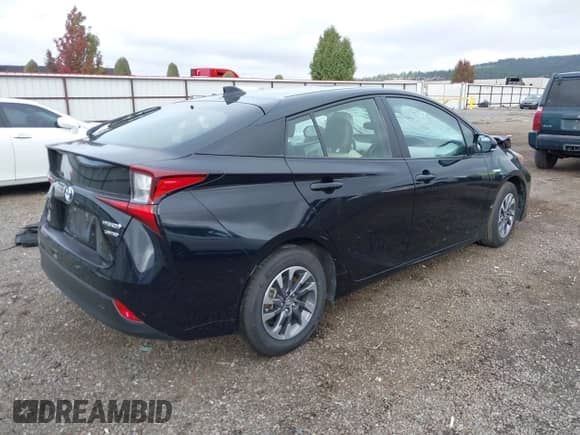 2022 Toyota Prius LE with VIN JTDKAMFU3N3187036, listed as a IAAI auction lot 43493399 with 98,731 mi miles and . Bid and sale history available at DreamBid. Image 4.