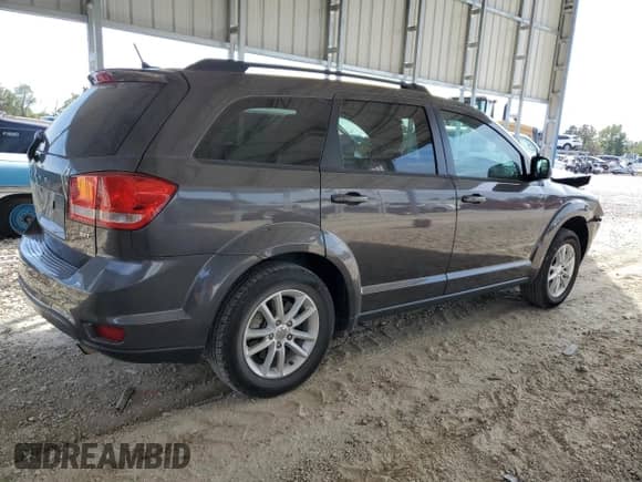 2017 Dodge Journey SXT with VIN 3C4PDCBB2HT507984, listed as a Copart auction lot 81929735 with 165,733 mi miles and Salvage title. Bid and sale history available at DreamBid. Image 3.