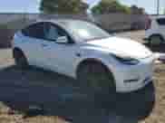 2022 Tesla Model Y Performance with VIN 7SAYGDEF1NF392212, listed as a Copart auction lot 85906245 with 34,897 mi miles and Salvage title. Bid and sale history available at DreamBid. Image 4.