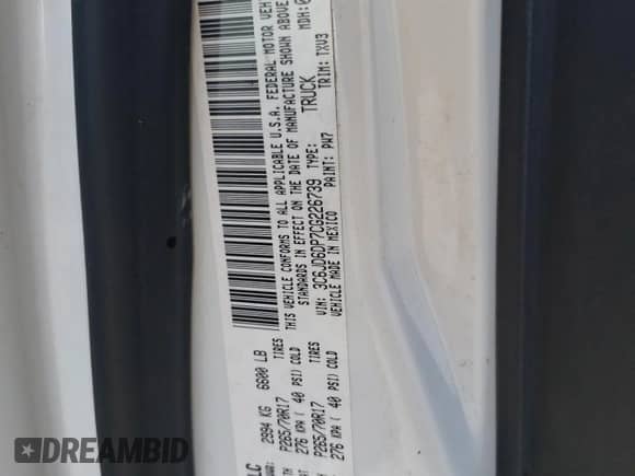 2012 Ram 1500 ST z VIN 3C6JD6DP7CG226739, wystawiony jako Copart lot #75513144 z przebiegiem 267 310 mil mil oraz Szkoda całkowita • Salvage title. Historia ofert i sprzedaży dostępna na DreamBid. Obrazek 13.