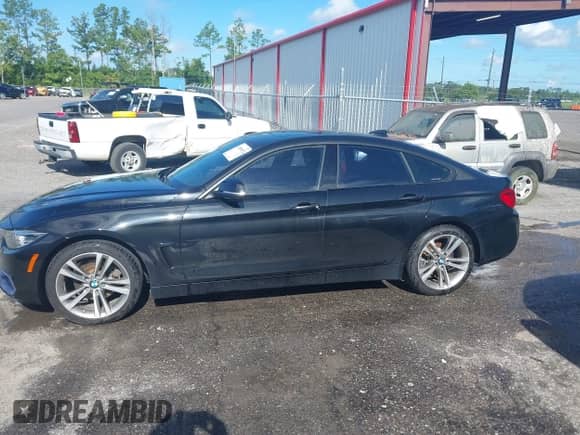 2018 BMW 4 Series 430i with VIN WBA4J1C51JBM10689, listed as a IAAI auction lot 42898652 with 111,516 mi miles and . Bid and sale history available at DreamBid. Image 14.