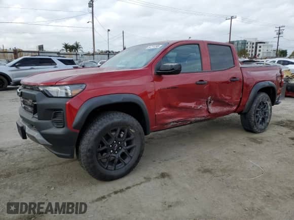 2023 Chevrolet Colorado 4WD Trail Boss с VIN 1GCPTEEK7P1185939, выставлен на аукционе Copart как лот 54711295 с пробегом 3 476 миль миль и Списание • Salvage title. История ставок и продаж доступна на DreamBid. Изображение 1.