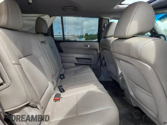 2015 Honda Pilot EX-L с VIN 5FNYF4H53FB051785, выставлен на аукционе Copart как лот 70082825 с пробегом Не указан миль и Списание • Salvage title. История ставок и продаж доступна на DreamBid. Изображение 11.