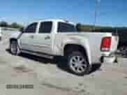 2012 GMC Sierra 1500 Denali with VIN 3GTP1XE2XCG236069, listed as a Copart auction lot 76631704 with 216,877 mi miles and Salvage title. Bid and sale history available at DreamBid. Image 2.