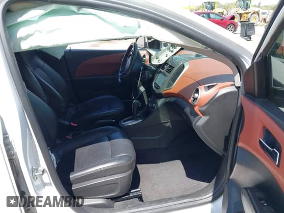 2015 Chevrolet Sonic LTZ with VIN 1G1JE5SBXF4140813, listed as a IAAI auction lot 42219942 with 102,165 mi miles and . Bid and sale history available at DreamBid. Image 5.