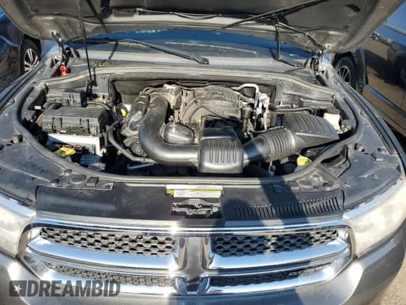 2012 Dodge Durango Crew z VIN 1C4RDJDG5CC112658, wystawiony jako Copart lot #70361875 z przebiegiem 215 458 mil mil oraz Czysty tytuł • Clean title. Historia ofert i sprzedaży dostępna na DreamBid. Obrazek 12.