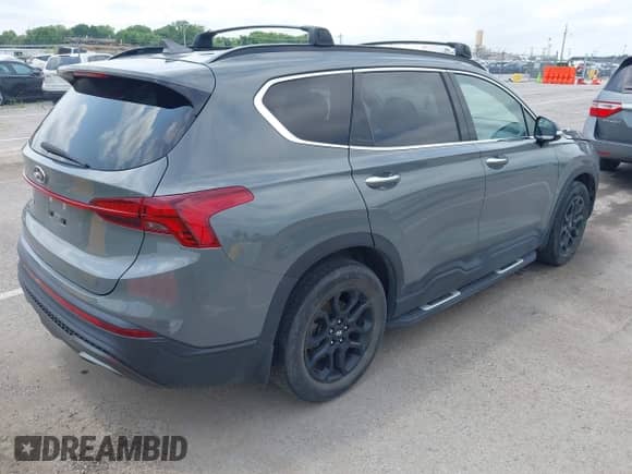 2022 Hyundai Santa Fe XRT with VIN 5NMS64AJ2NH449628, listed as a IAAI auction lot 42729354 with 47,854 mi miles and . Bid and sale history available at DreamBid. Image 4.