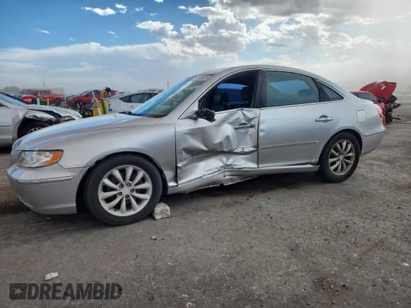 2007 Hyundai Azera SE with VIN KMHFC46FX7A155031, listed as a Copart auction lot 80005625 with 137,076 mi miles and Salvage title. Bid and sale history available at DreamBid. Image 1.