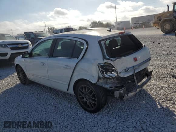 2008 Saturn Astra XR with VIN W08AT671985115975, listed as a Copart auction lot 77409614 with 112,702 mi miles and Salvage title. Bid and sale history available at DreamBid. Image 2.