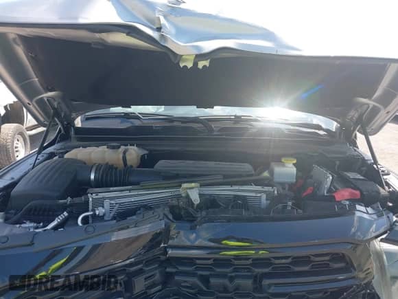 2022 Ram 1500 Big Horn z VIN 1C6RRFFG7NN401311, wystawiony jako IAAI lot #42803692 z przebiegiem 72 150 mil mil oraz . Historia ofert i sprzedaży dostępna na DreamBid. Obrazek 10.