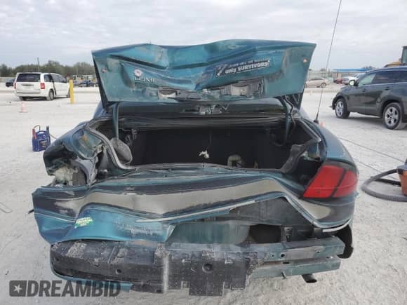 1997 Chevrolet Lumina LS with VIN 2G1WL52M1V9120300, listed as a Copart auction lot 87460394 with 142,588 mi miles and Salvage title. Bid and sale history available at DreamBid. Image 6.
