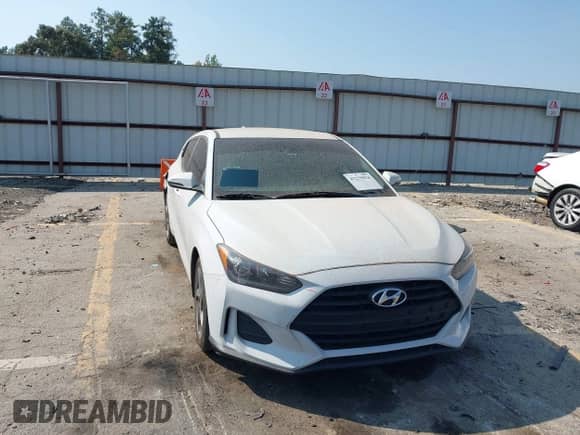 2019 Hyundai Veloster 2.0 z VIN KMHTG6AF5KU017267, wystawiony jako IAAI lot #43259926 z przebiegiem 135 451 mil mil oraz . Historia ofert i sprzedaży dostępna na DreamBid. Obrazek 1.