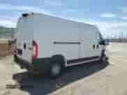 2022 Ram ProMaster Cargo with VIN 3C6LRVDG7NE123646, listed as a Copart auction lot 59696005 with 200,141 mi miles and Salvage title. Bid and sale history available at DreamBid. Image 3.