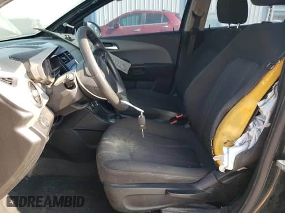 2014 Chevrolet Sonic LT with VIN 1G1JC5SH4E4117973, listed as a Copart auction lot 67087163 with 167,345 mi miles and Salvage title. Bid and sale history available at DreamBid. Image 7.
