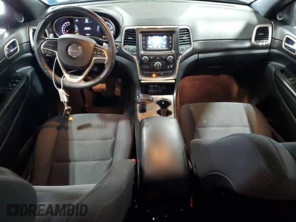 2014 Jeep Grand Cherokee Laredo z VIN 1C4RJFAG2EC128782, wystawiony jako Copart lot #59777465 z przebiegiem 146 642 mil mil oraz Czysty tytuł • Clean title. Historia ofert i sprzedaży dostępna na DreamBid. Obrazek 8.