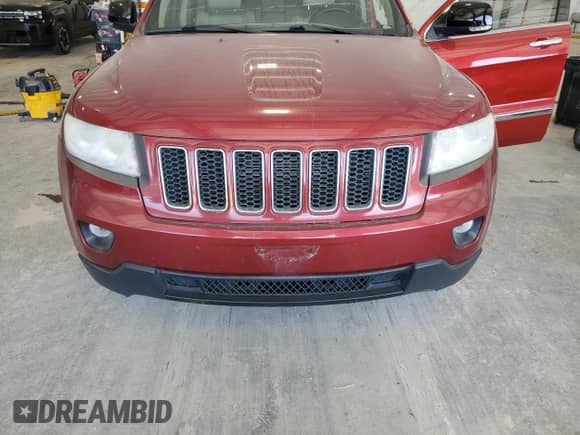 2012 Jeep Grand Cherokee Limited z VIN 1C4RJFBG1CC276028, wystawiony jako Copart lot #81590625 z przebiegiem 179 186 mil mil oraz Szkoda całkowita • Salvage title. Historia ofert i sprzedaży dostępna na DreamBid. Obrazek 12.