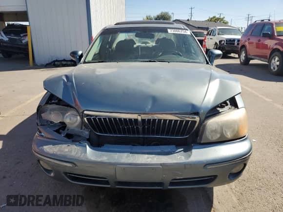 2002 Hyundai XG L z VIN KMHFU45E12A225689, wystawiony jako Copart lot #73006754 z przebiegiem 182 430 mil mil oraz Szkoda całkowita • Salvage title. Historia ofert i sprzedaży dostępna na DreamBid. Obrazek 5.