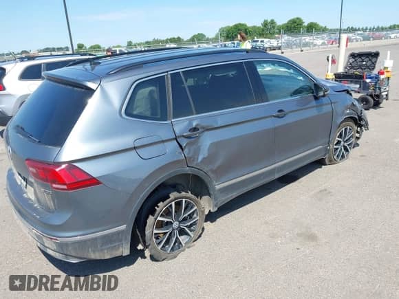 2021 Volkswagen Tiguan SE с VIN 3VV2B7AX4MM091592, выставлен на аукционе IAAI как лот 42520122 с пробегом 87 485 миль миль и . История ставок и продаж доступна на DreamBid. Изображение 4.