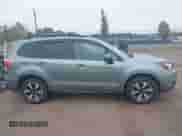 2018 Subaru Forester Premium z VIN JF2SJAEC2JH586302, wystawiony jako IAAI lot #43186549 z przebiegiem 122 233 mil mil oraz . Historia ofert i sprzedaży dostępna na DreamBid. Obrazek 13.