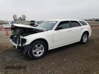 2007 Dodge Magnum with VIN 2D4FV47V57H623322, listed as a Copart auction lot 73356244 with 200,976 mi miles and Salvage title. Bid and sale history available at DreamBid. Image 1.