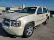 2013 Chevrolet Tahoe LTZ с VIN 1GNSCCE06DR345018, выставлен на аукционе Copart как лот 86178385 с пробегом 201 689 миль миль и Списание • Salvage title. История ставок и продаж доступна на DreamBid. Изображение 1.