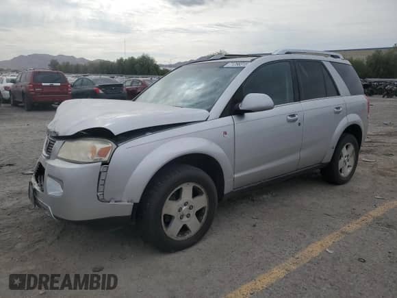 2007 Saturn VUE V6 with VIN 5GZCZ63437S800180, listed as a Copart auction lot 71256315 with 194,732 mi miles and Salvage title. Bid and sale history available at DreamBid. Image 1.