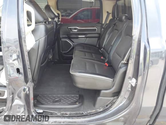 2021 Ram 1500 Laramie with VIN 1C6RREJT4MN821315, listed as a IAAI auction lot 42528986 with 88,959 mi miles and . Bid and sale history available at DreamBid. Image 8.