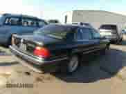 1998 BMW 7 Series 740iL with VIN WBAGJ8324WDM10533, listed as a IAAI auction lot 34978212 with Not provided miles and . Bid and sale history available at DreamBid. Image 4.