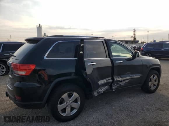 2013 Jeep Grand Cherokee Limited z VIN 1C4RJFBG7DC648943, wystawiony jako Copart lot #85731515 z przebiegiem 200 146 mil mil oraz Szkoda całkowita • Salvage title. Historia ofert i sprzedaży dostępna na DreamBid. Obrazek 3.